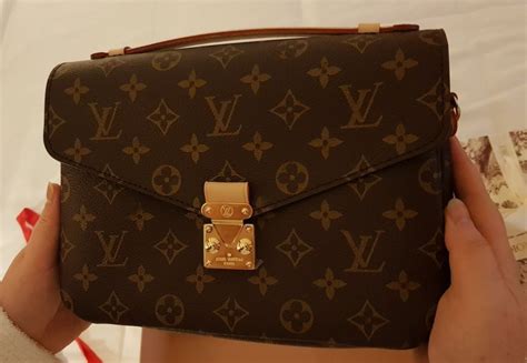 como saber si una bolsa de louis vuitton es original|bolsa original louis vuitton.